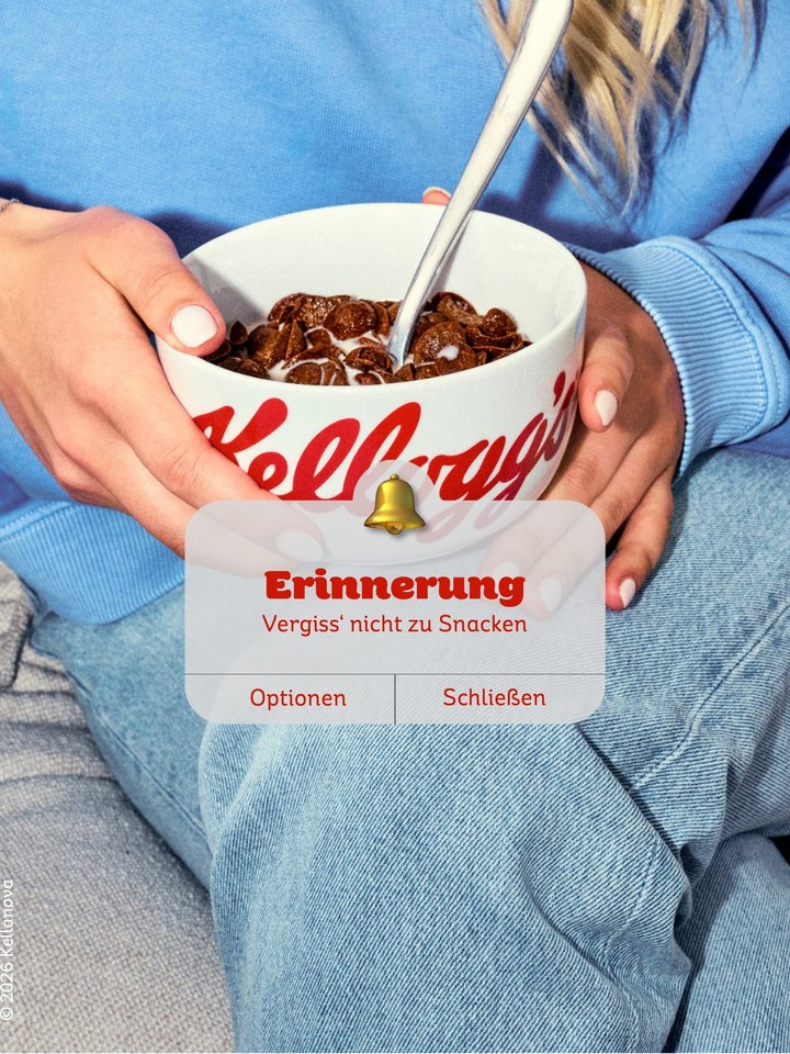 Schoko-Cerealien mit eingeblendeter Erinnerung „Vergiss‘ nicht zu Snacken“